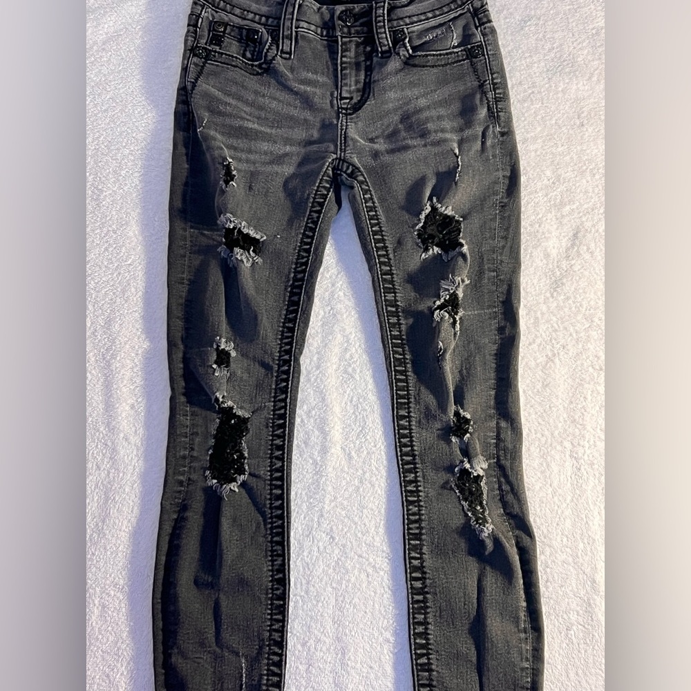 Ripped black wash Miss Me jeans!